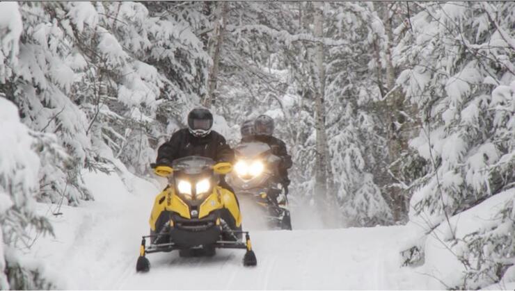snowmobiles on trail