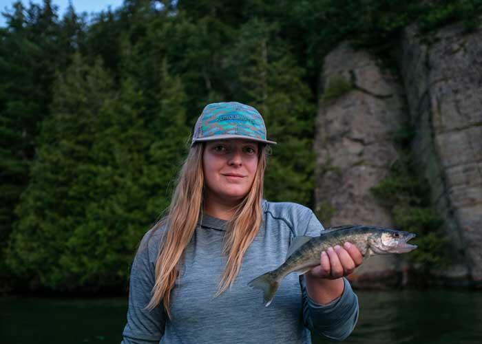 woman angler holding ontario walleye