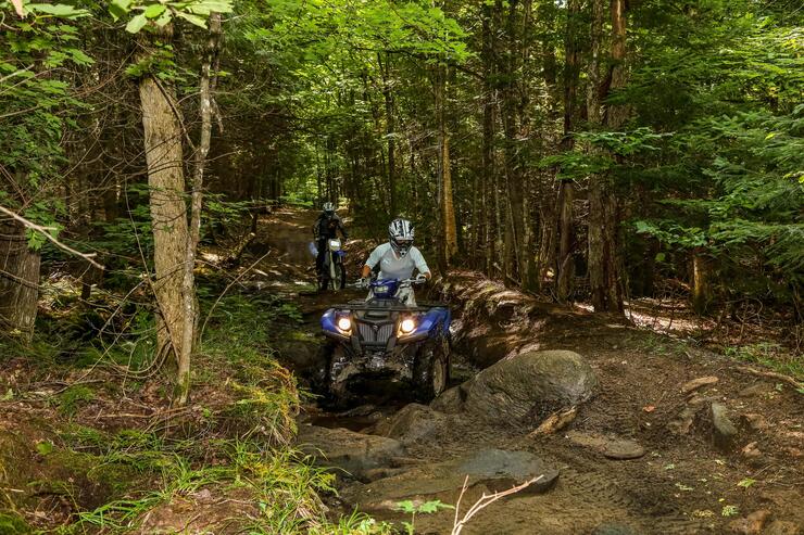 Miesha Tate and Bryan Caraway riding Yamaha ATV and dirt bike in Ontario