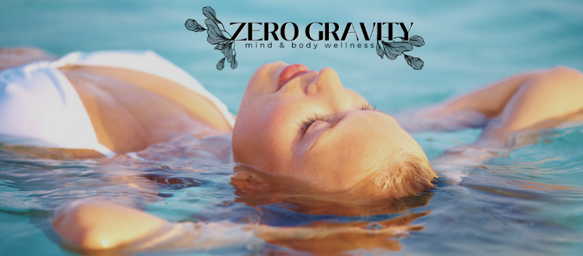 a woman in a bathing suit floating suspended in a pool of clear water, looking peaceful.