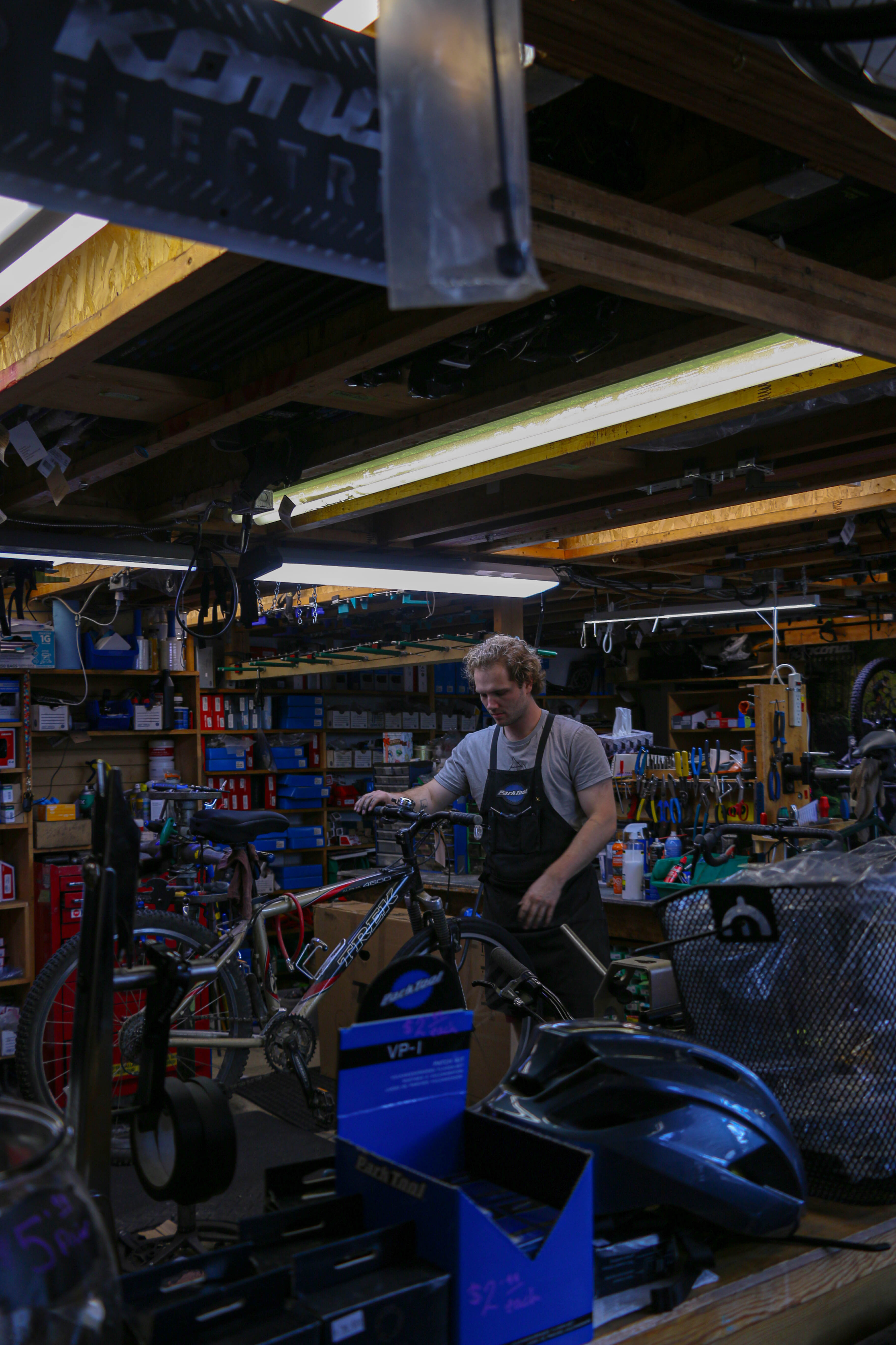Individual repairing a bike