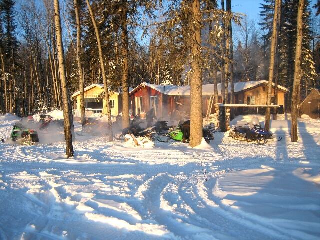 sledders outside lodge