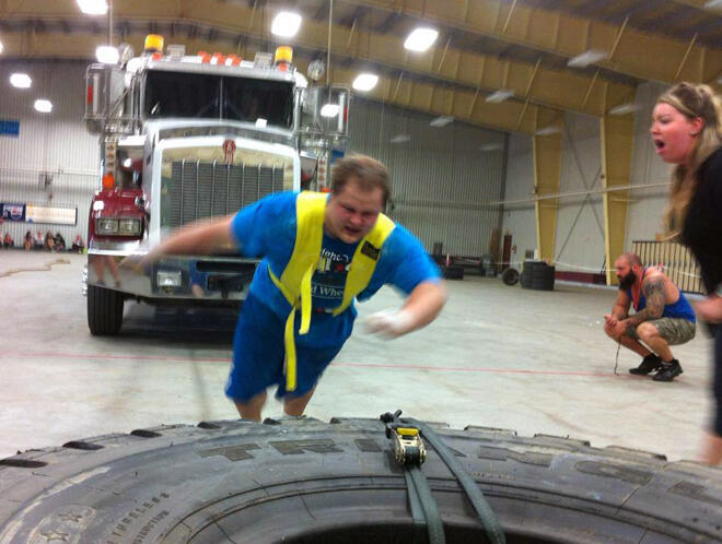 Contestant at the Weights and Wheels pulling a semi! Thanks to CKDR for the photo.