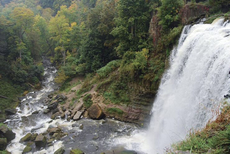 Water cascading over rock face