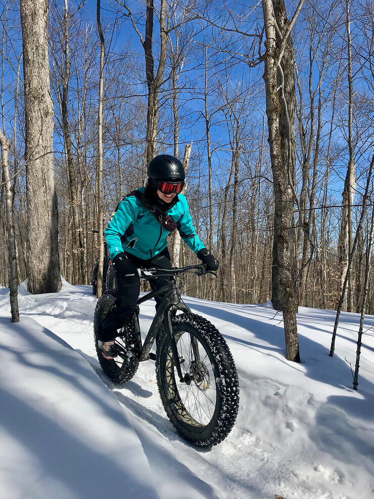 Connie organized an International Women's Day event for women in the North Bay community to try fat biking. Thirty women participated and all three bike shops in North Bay provided fat bikes for participants to use. Pictured here is Connie's friend, Geraldine rocking the winter riding! Photo: Connie Hergott