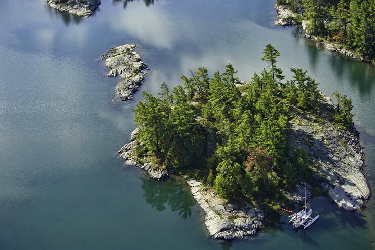 Small rocky islands surrounded by turquoise water.
