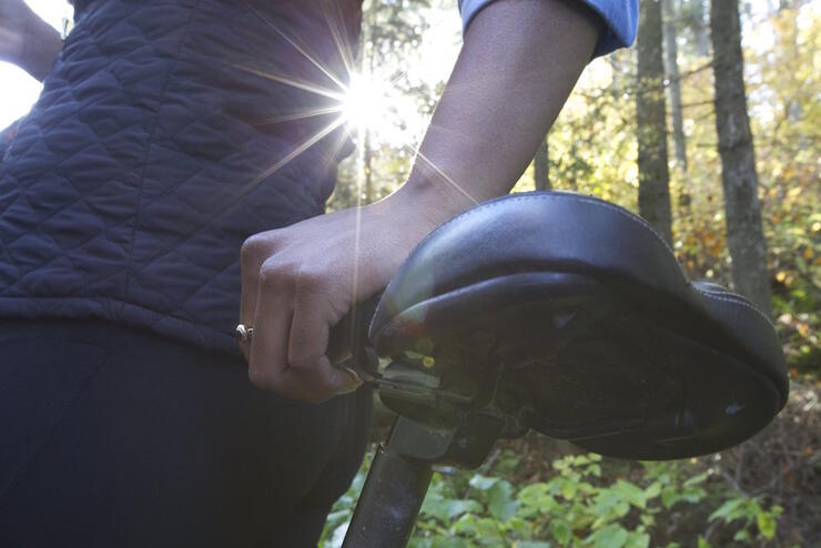 Close up of a wide bicycle set with person's hand