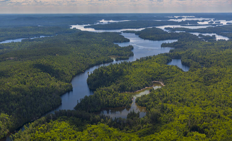 Aerial view of large lake with islands and river