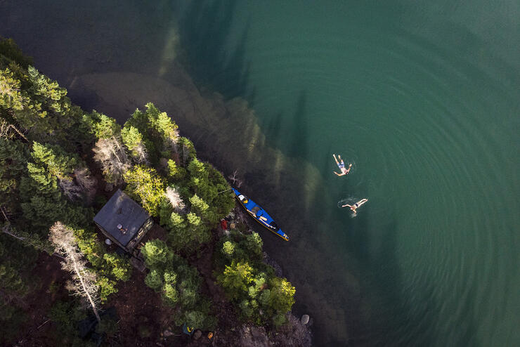 Overhead shot of people floating in the water.