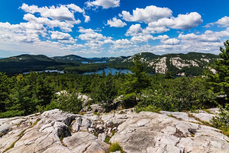 View of a turquoise lake and white mountain landscape 