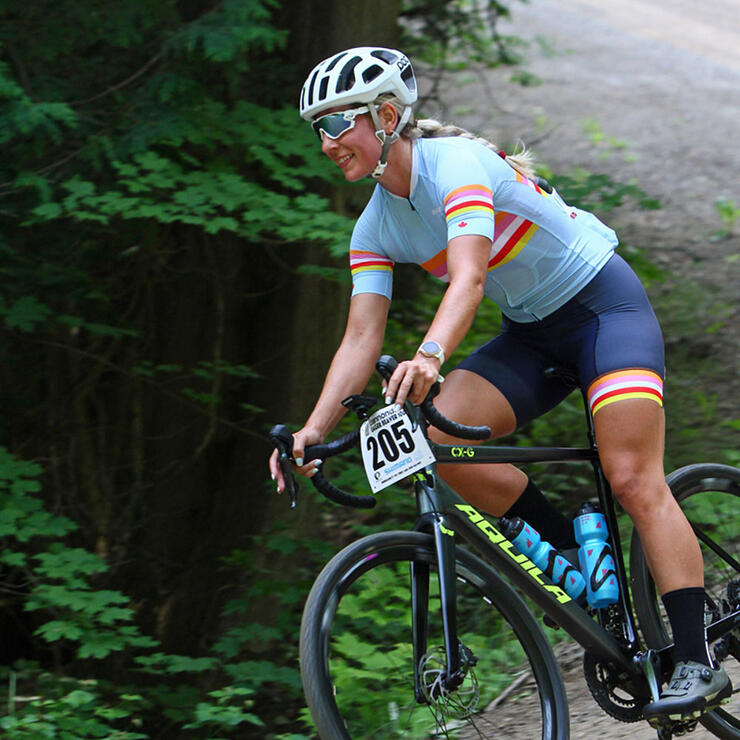 Woman pedalling gravel bike