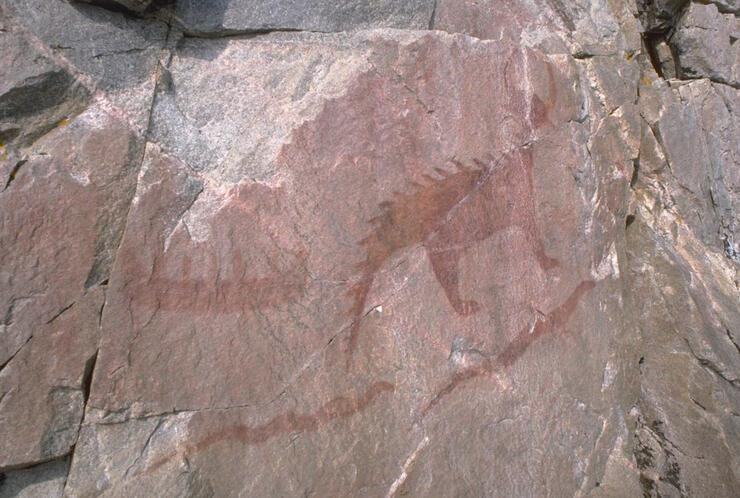 Red pictograph on rock wall