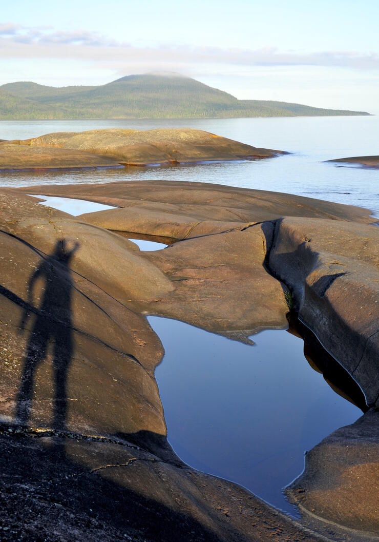 Shadow of photographer taking a photo of Pic Island.