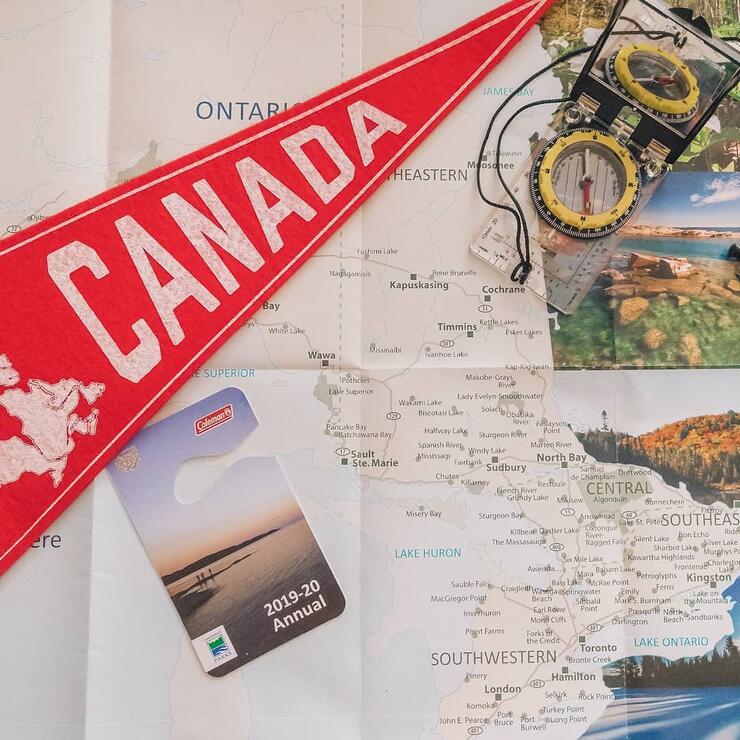 Map of Ontario with a Canada banner and Ontario Parks pass.