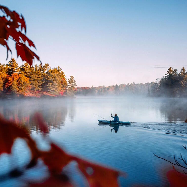 Kayaker on a beautiful lake.