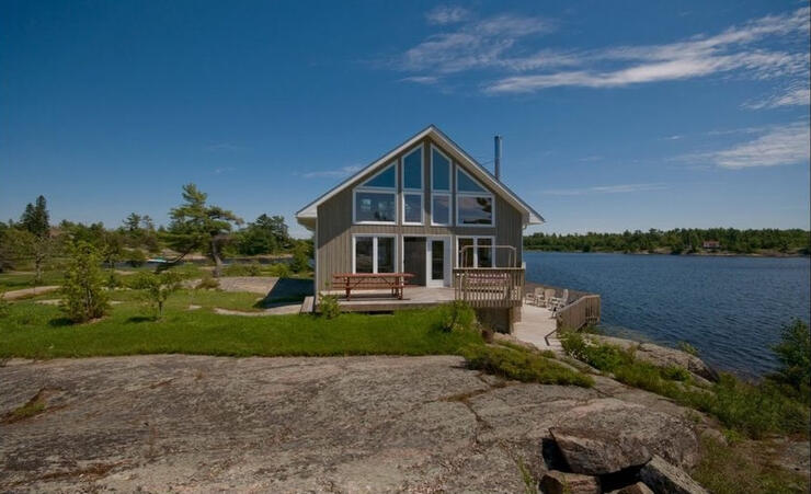 Small two storey cottage beside Georgian Bay. 