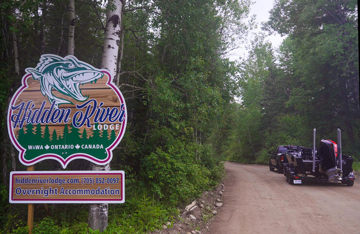 Hidden River Lodge sign