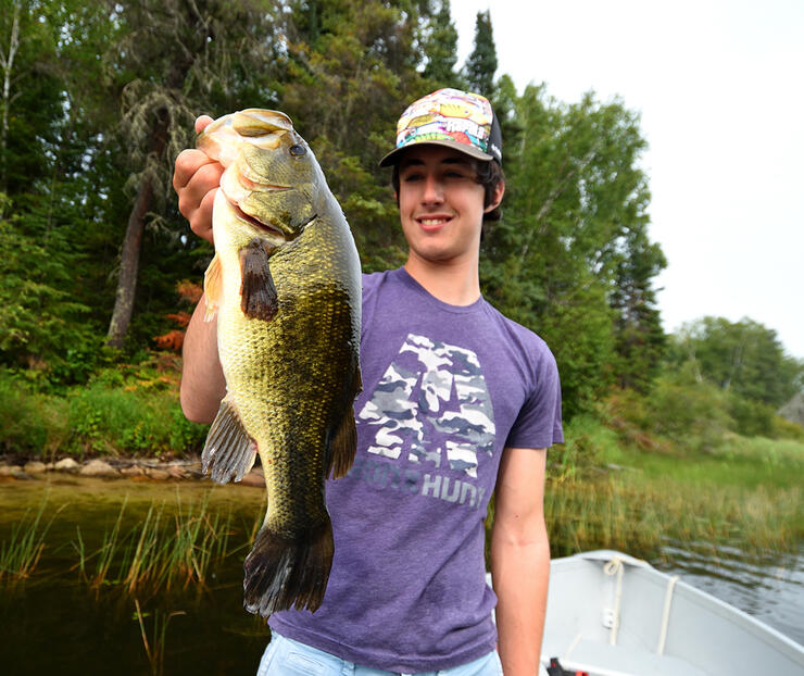 Grandson with a bass