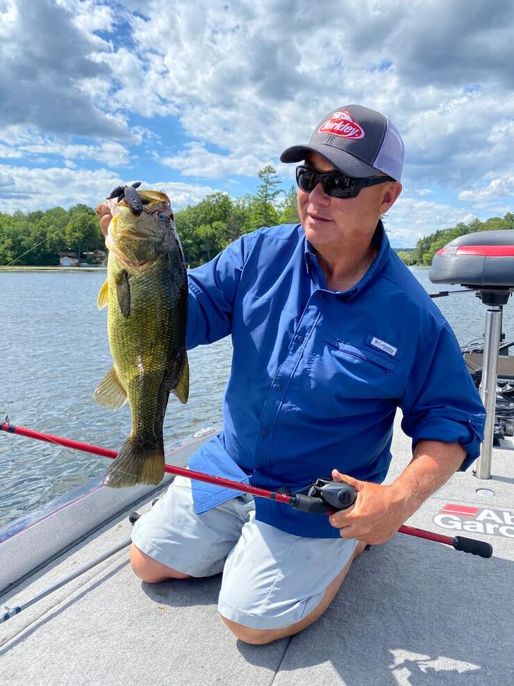angler with bass