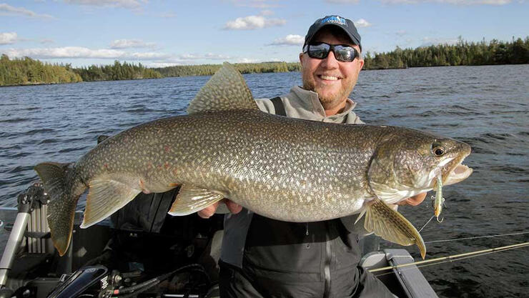 angler fishing lake trout