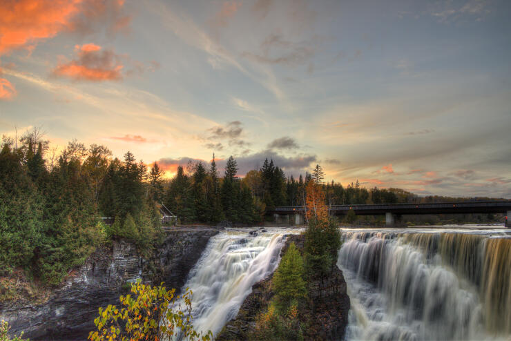 Waterfall during autumn with colourful leaves