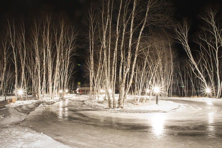 Skating trail lit up at night.