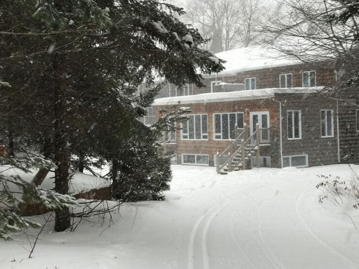 The Stokely Creek Lodge sits still amid the snow
