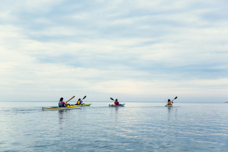 People in sea kayaks on Georgian Bay