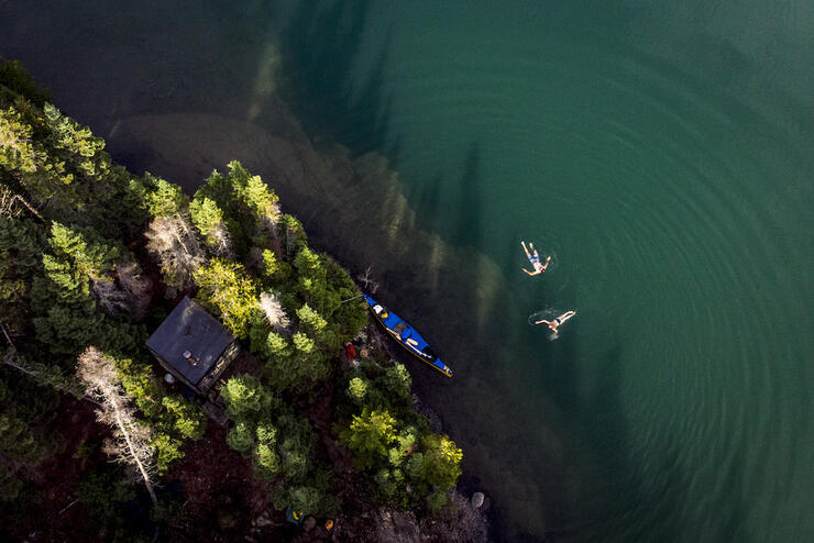 Drone shot of people swimmig