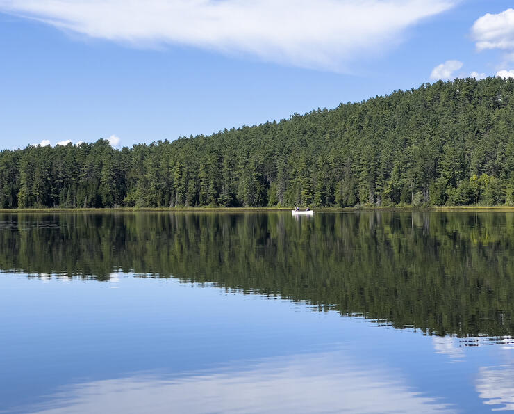 White canoe on calm waters 