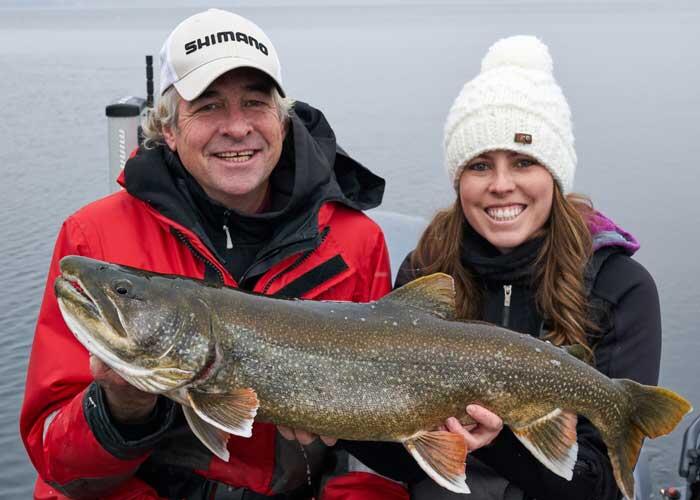2 anglers with lake trout