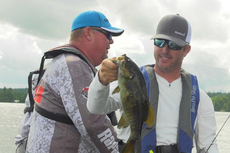 anglers with smallmouth bass