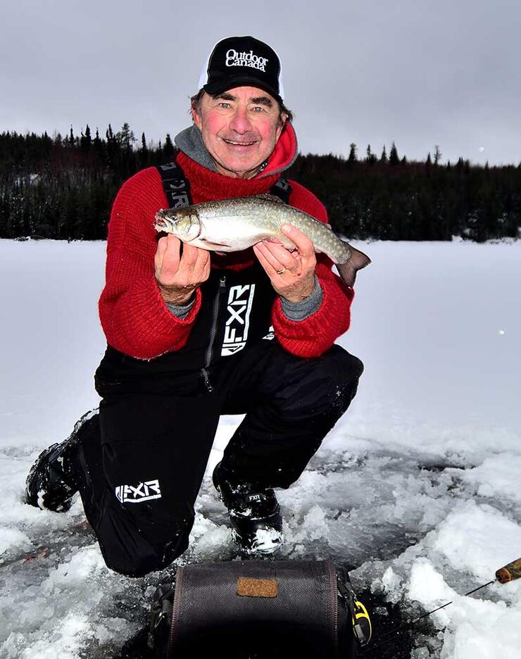 angler trout ice fishing