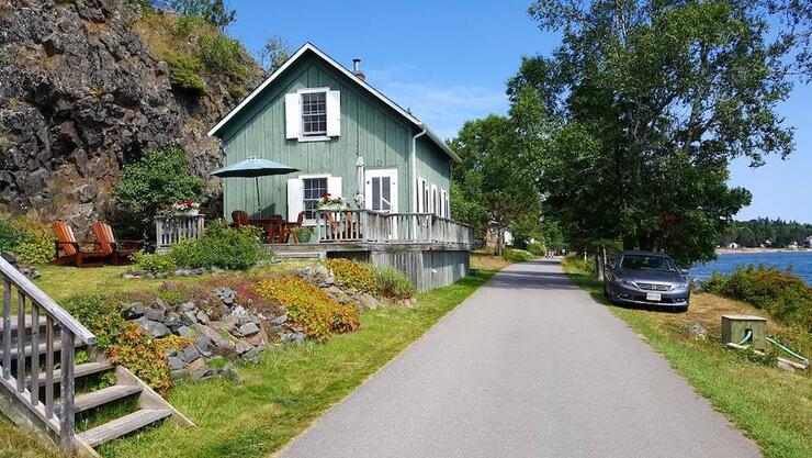 Road next to old house