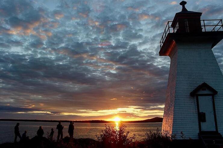 Lighthouse with water in background