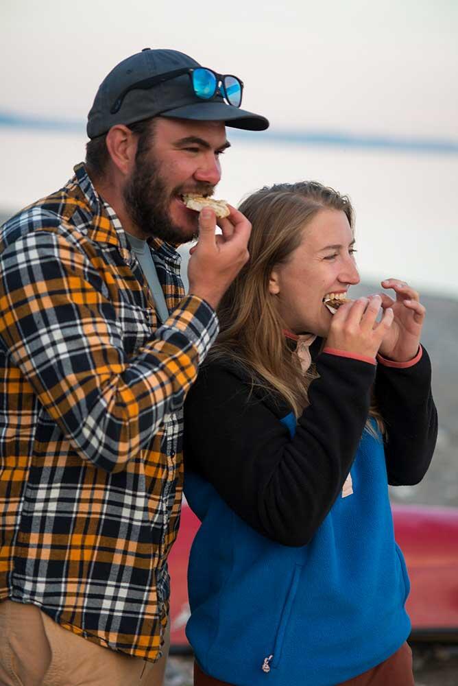 2 people eating food