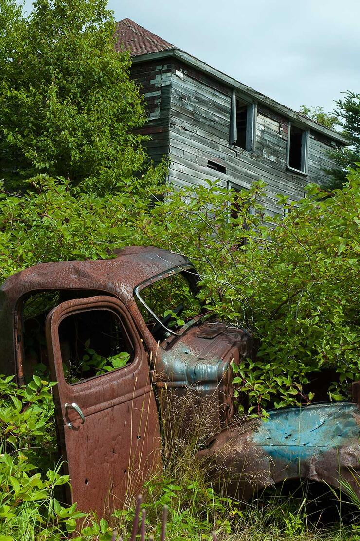 abandoned truck and house