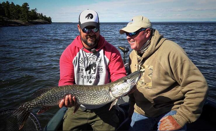 2 anglers in boat northern pike fishing
