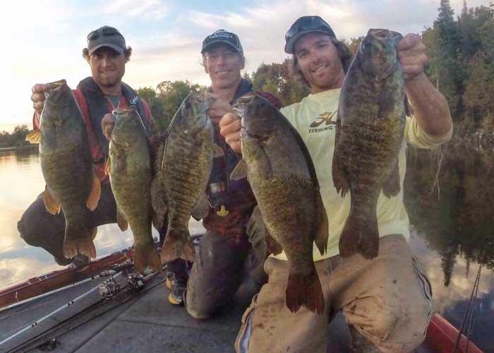 adam vallee, james smedley, tyler dunn with smallmouth bass