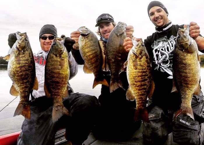 adam vallee, tyler dunn holding fall bass