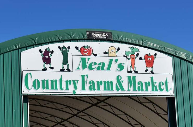 neal's country market sign