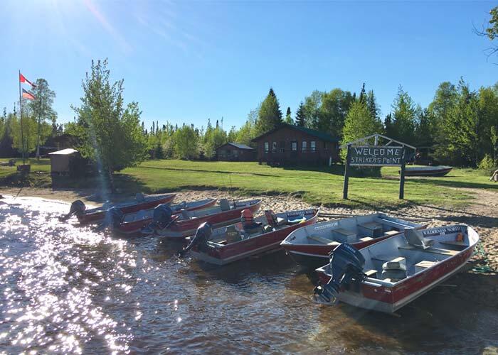 docked boats at striker's point lodge