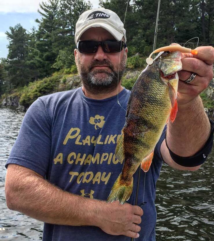 angler holding perch